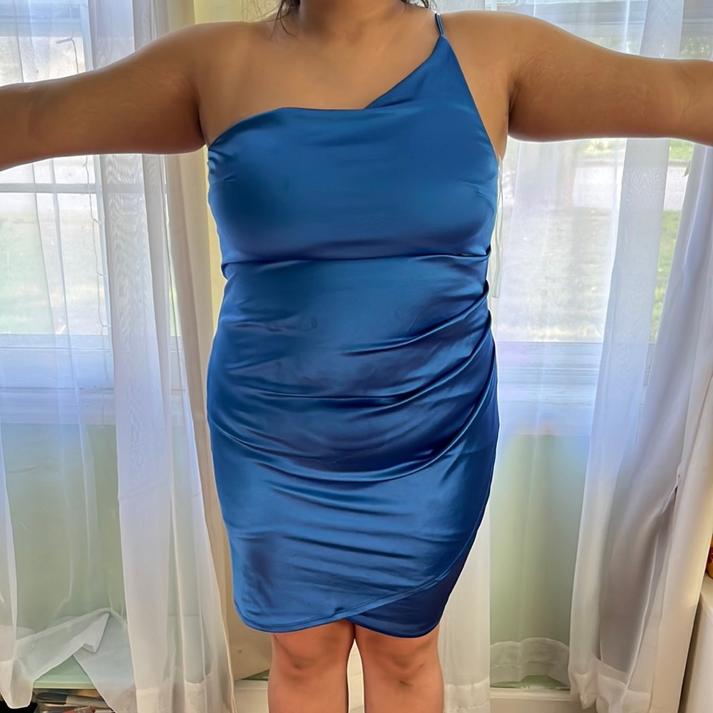 Silk Light royal blue, 2straps on one shoulder, Goes down to a little above knee